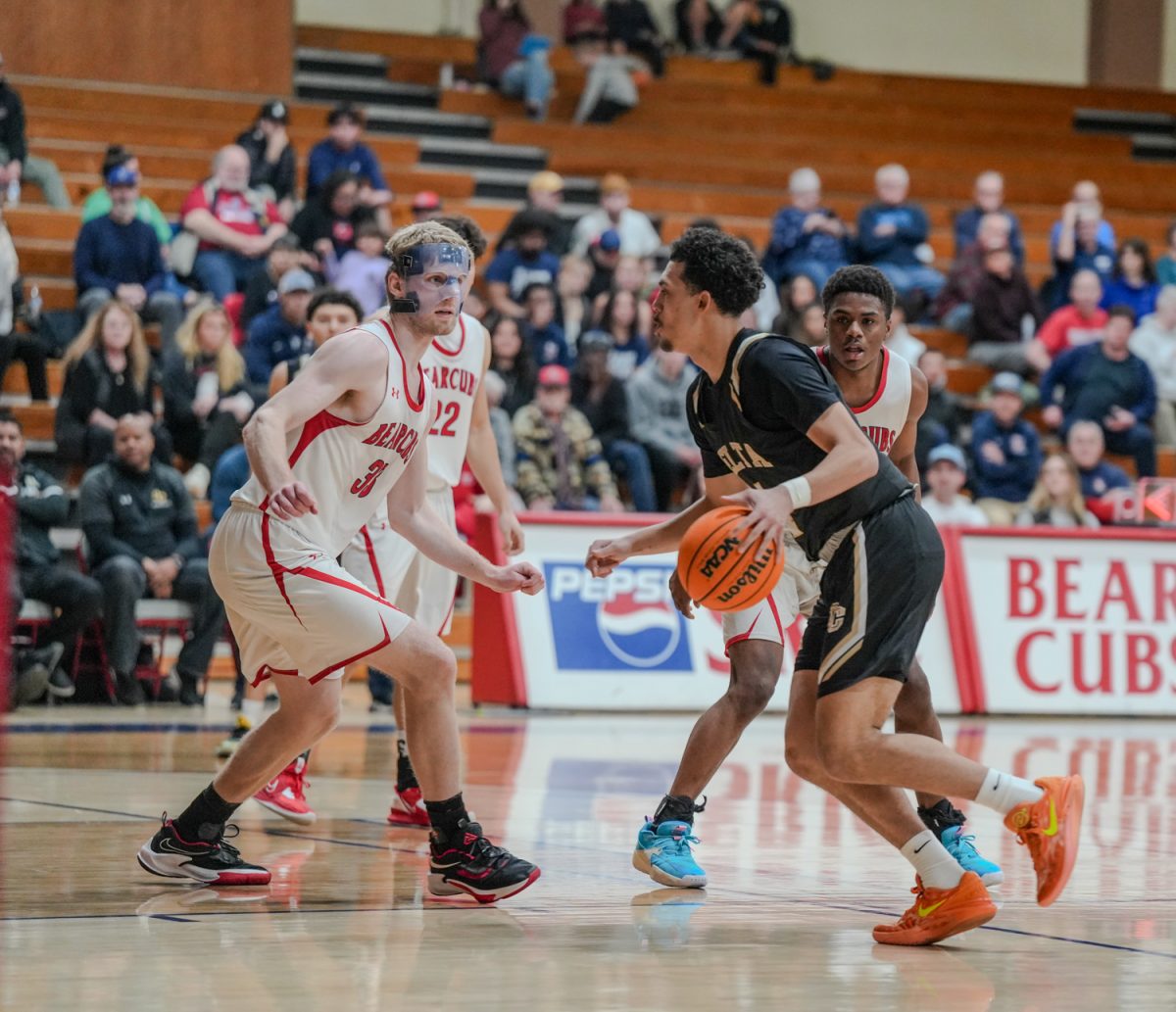 SRJC forward Justin Smith switching on and guarding the paint at Santa Rosa’s Haehl Pavilion Feb. 2, 2024