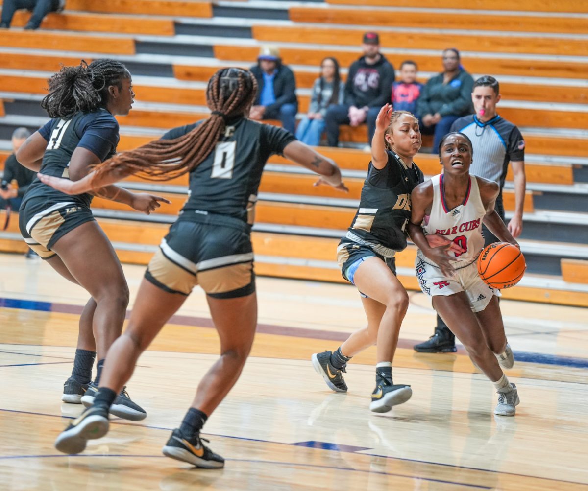 SRJC guard Reese Searcy drives through tough pressure to get to the basket at Santa Rosa’s Haehl Pavilion Feb. 2, 2024