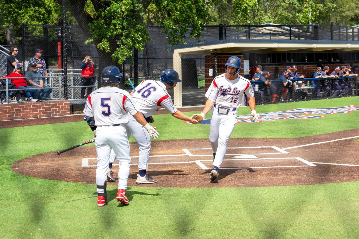 Outfielder Zane Bennett scores on catcher Cameron Durans single to right field in the bottom of the fourth against American River College at Santa Rosas Cook Sypher Field on Thursday, April 25, 2024.