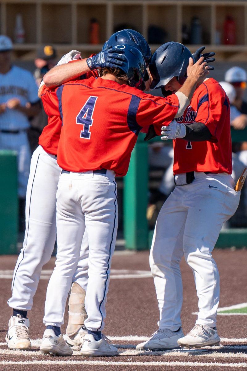 Center fielder Alex Leopard, right, celebrates with Jake McCoy and Cameron Duran, left, after his home run in the bottom of the sixth against Chabot College in the second round of the CCCAA Super Regionals in Hayward on Thursday, May 9, 2024.
