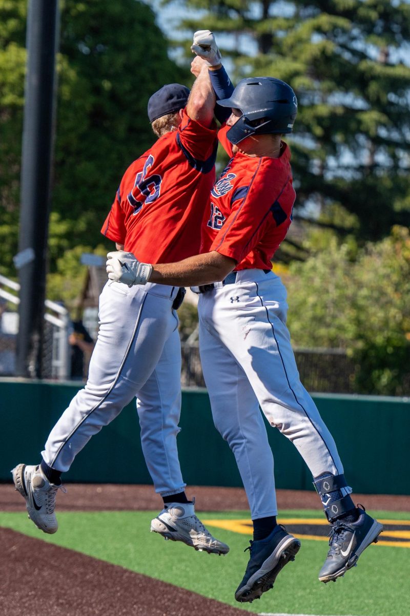 Left fielder Zane Bennett, right, celebrates with Jake McCoy after Bennetts solo home run against Chabot College in the second round of the CCCAA Super Regionals in Hayward on Thursday, May 9, 2024.