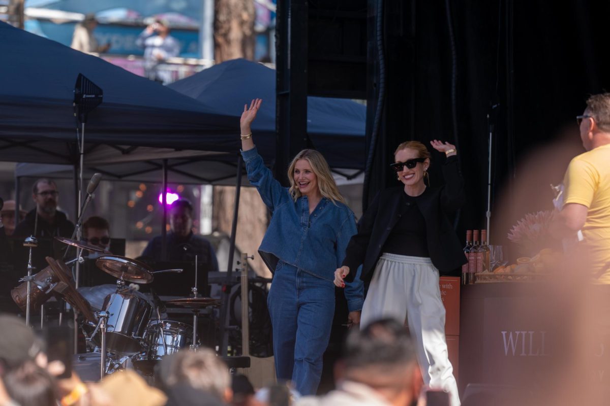 Cameron Diaz, left, and Katherine Power, right, make an entrance onto the Williams-Sonoma Culinary Stage at BottleRock Napa Valley on Friday, May 24, 2024.