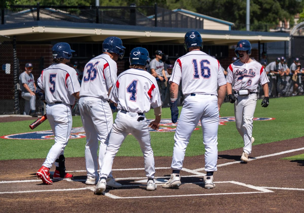 Keenan Morris is greeted at home plate by (from left to right) Gabe Henschel, Josh Martin, Cameron Duran, and Jake McCoy after his grand slam in the bottom of the fourth against College of San Mateo in game 1 of the CCCAA Regional Playoffs at home on Thursday, May 2, 2024.