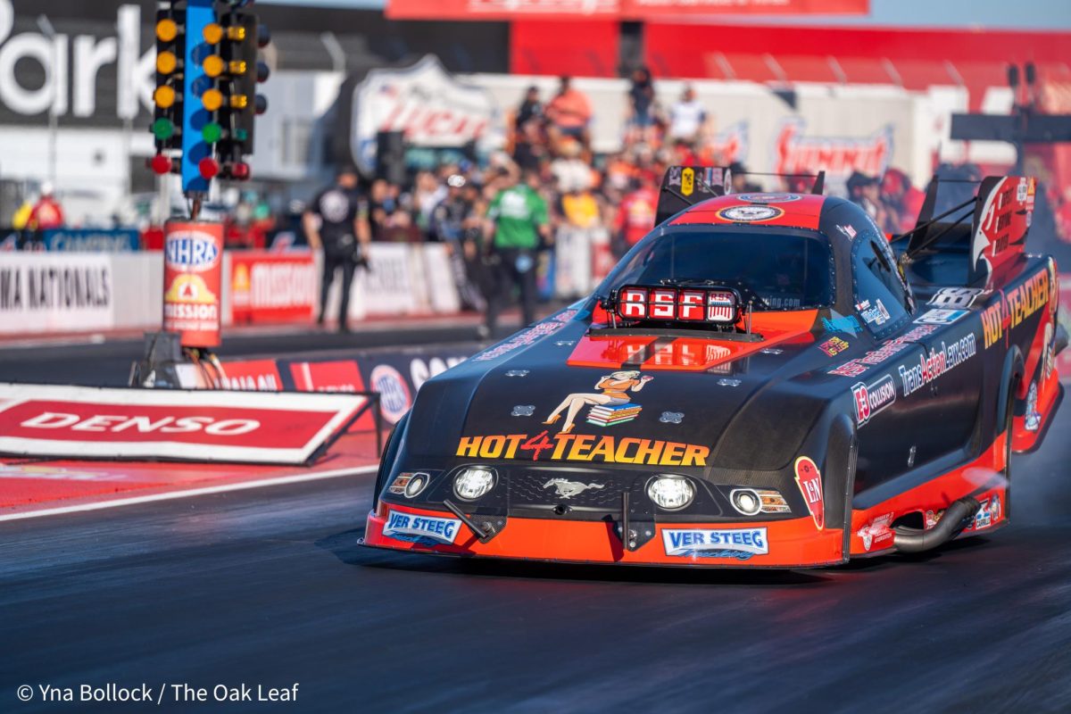 Funny Car driver Alex Miladinovich rolls forward prior his run at the DENSO NHRA Sonoma Nationals on Friday, July 26, 2024 in Sonoma.