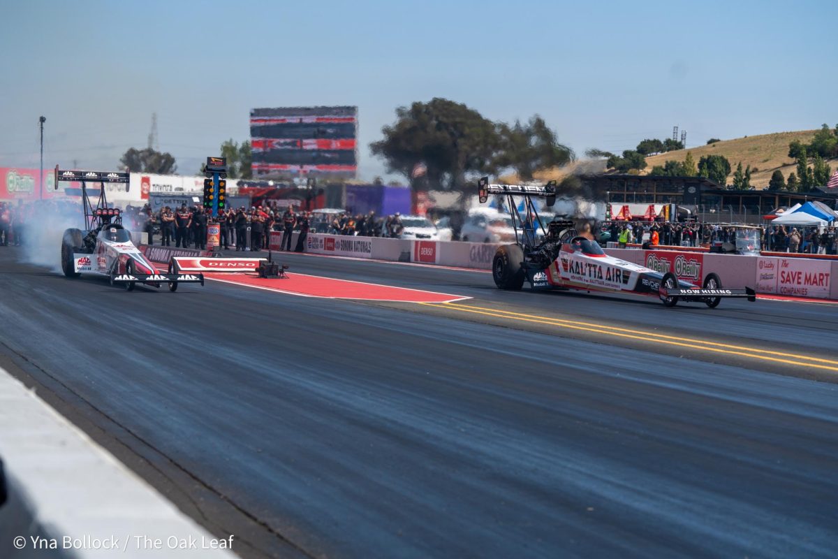 Top Fuel driver Doug Kalitta (left) and Shawn Langdon (right) take off during Saturday's run at the DENSO NHRA Sonoma Nationals on Saturday, July 27, 2024 in Sonoma. 