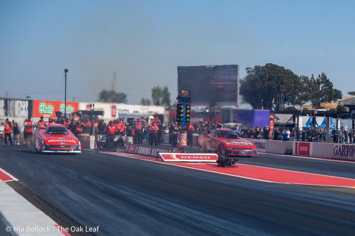 Funny Car drivers Bob Tasca III (left) and Matt Hagan (right) compete against one another during Saturday's run at the DENSO NHRA Sonoma Nationals on Saturday, July 27, 2024 in Sonoma. 