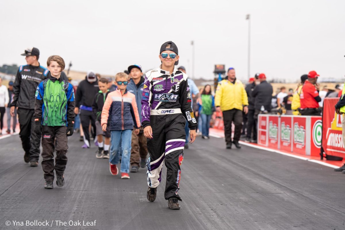 More fans make their way back towards the starting line after the Seal Master NHRA Track Walk at the DENSO NHRA Sonoma Nationals on Sunday, July 28, 2024 in Sonoma. 