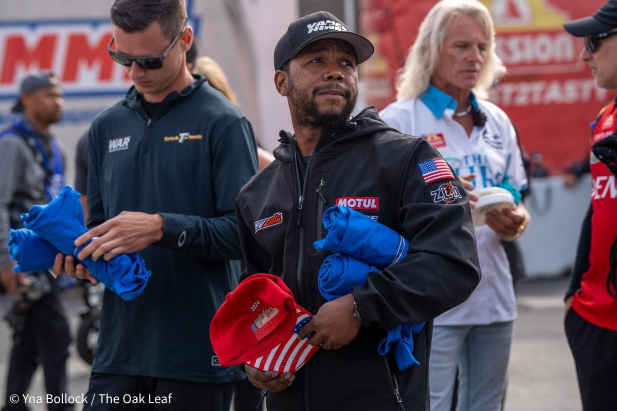 Pro Stock Motorcycle drivers (from left to right) Chase Van Sant and Richard Gadson get ready to enter the stage during pre-race ceremonies at the DENSO NHRA Sonoma Nationals on Sunday, July 28, 2024 in Sonoma. 