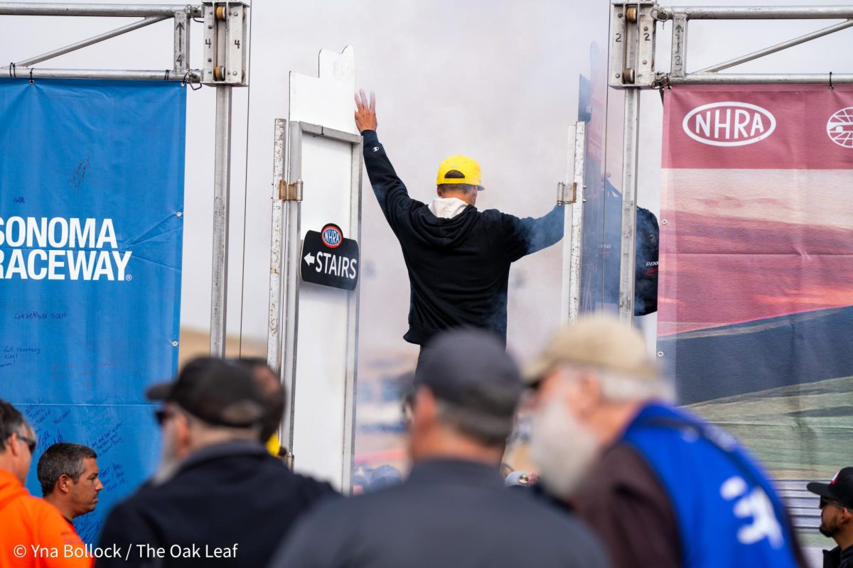 Funny Car driver Bob Tasca III enters the stage during pre-race ceremonies at the DENSO NHRA Sonoma Nationals on Sunday, July 28, 2024 in Sonoma. 