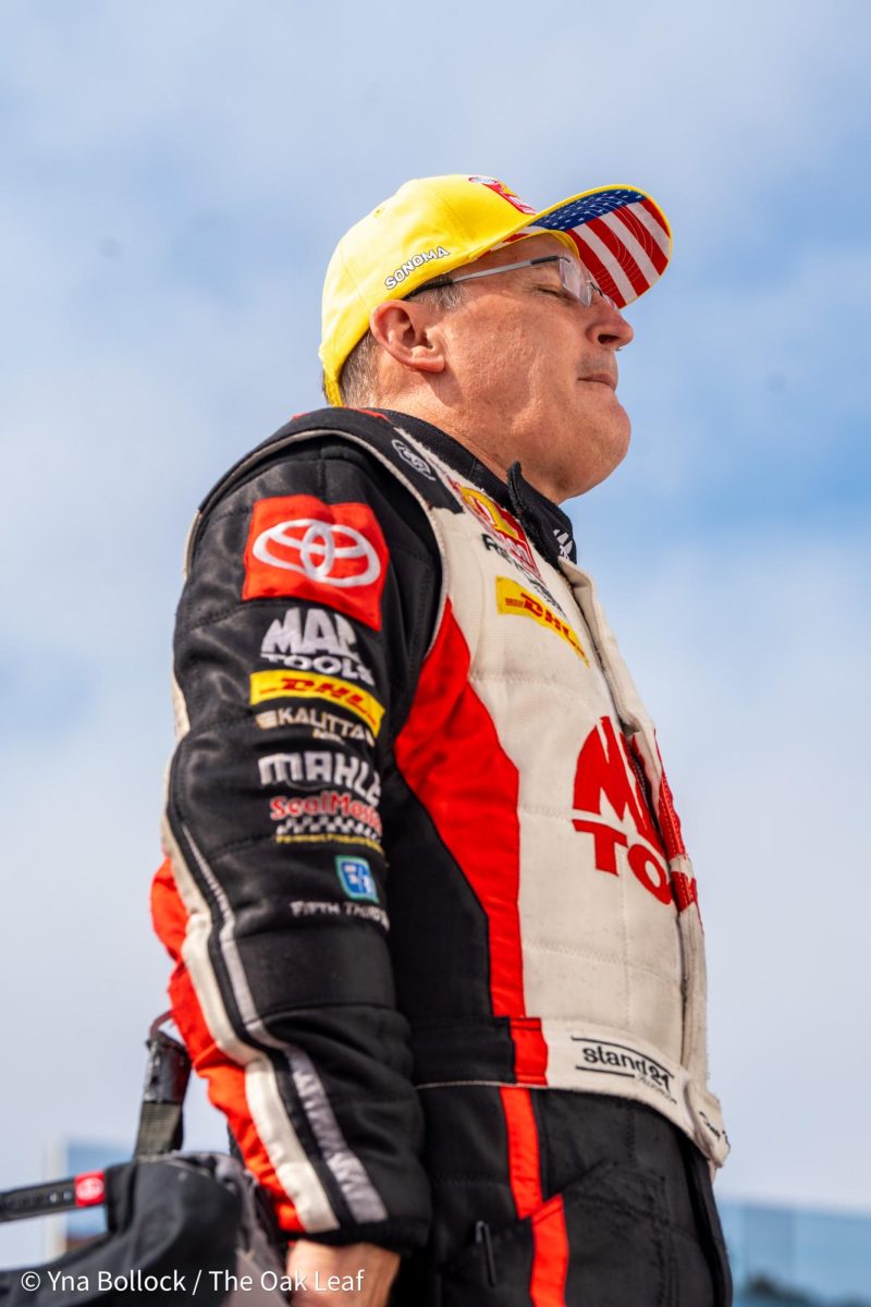 Top Fuel driver Doug Kalitta takes a moment before entering the stage for driver introductions during the pre-race ceremonies at the DENSO NHRA Sonoma Nationals on Sunday, July 28, 2024 in Sonoma. 