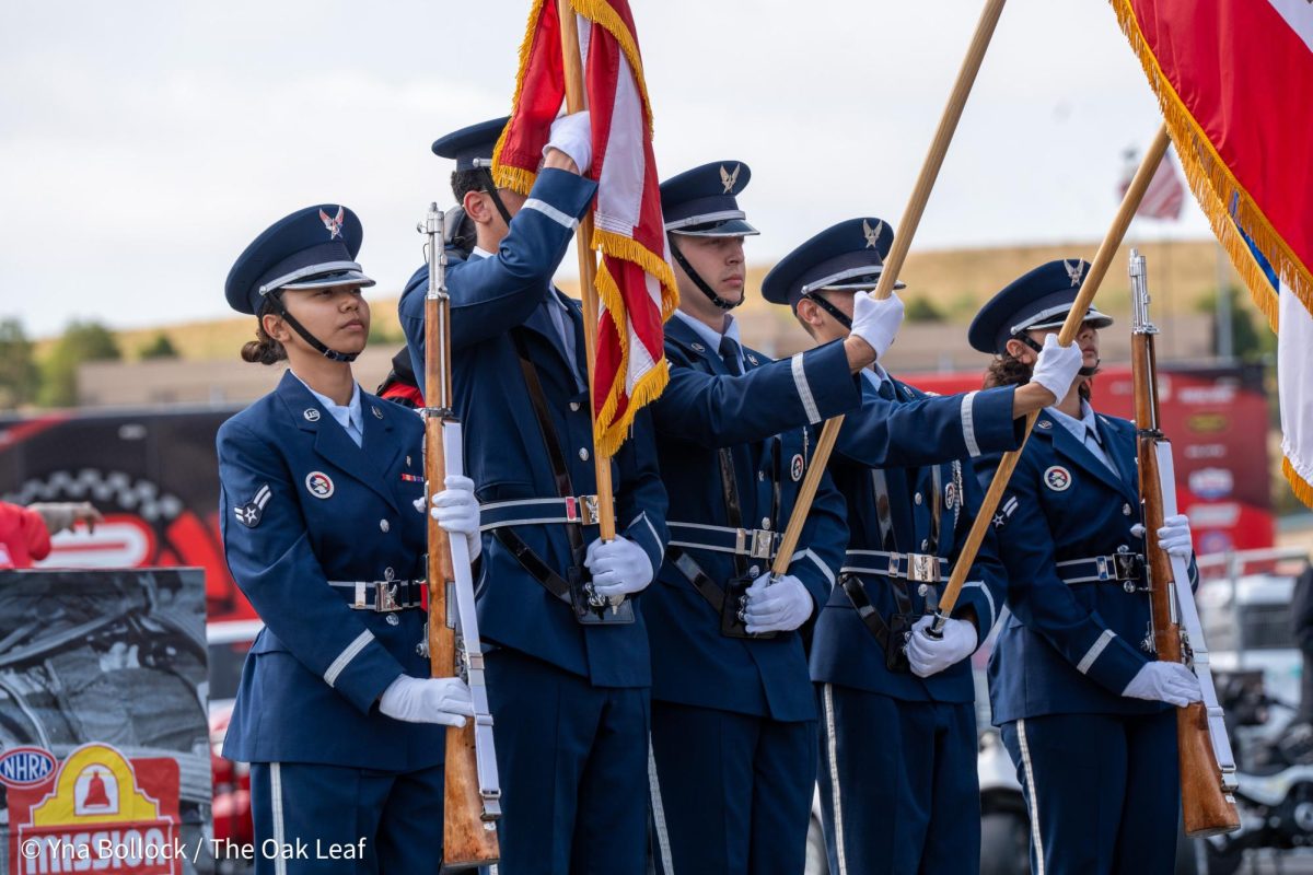 The Travis Air Force Base Color Guard stand solemnly for the presentation of colors before the national anthem at the DENSO NHRA Sonoma Nationals on Sunday, July 28, 2024 in Sonoma. 