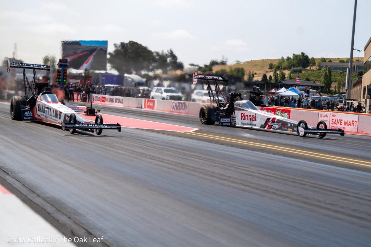 Top Fuel drivers Shawn Langdon (left) and Tony "Smoke" Stewart (right) compete in the first round of eliminations at the DENSO NHRA Sonoma Nationals on Sunday, July 28, 2024 in Sonoma. Smoke wins the first round of the day with a run of 3.740 ET at 331.12 mph.