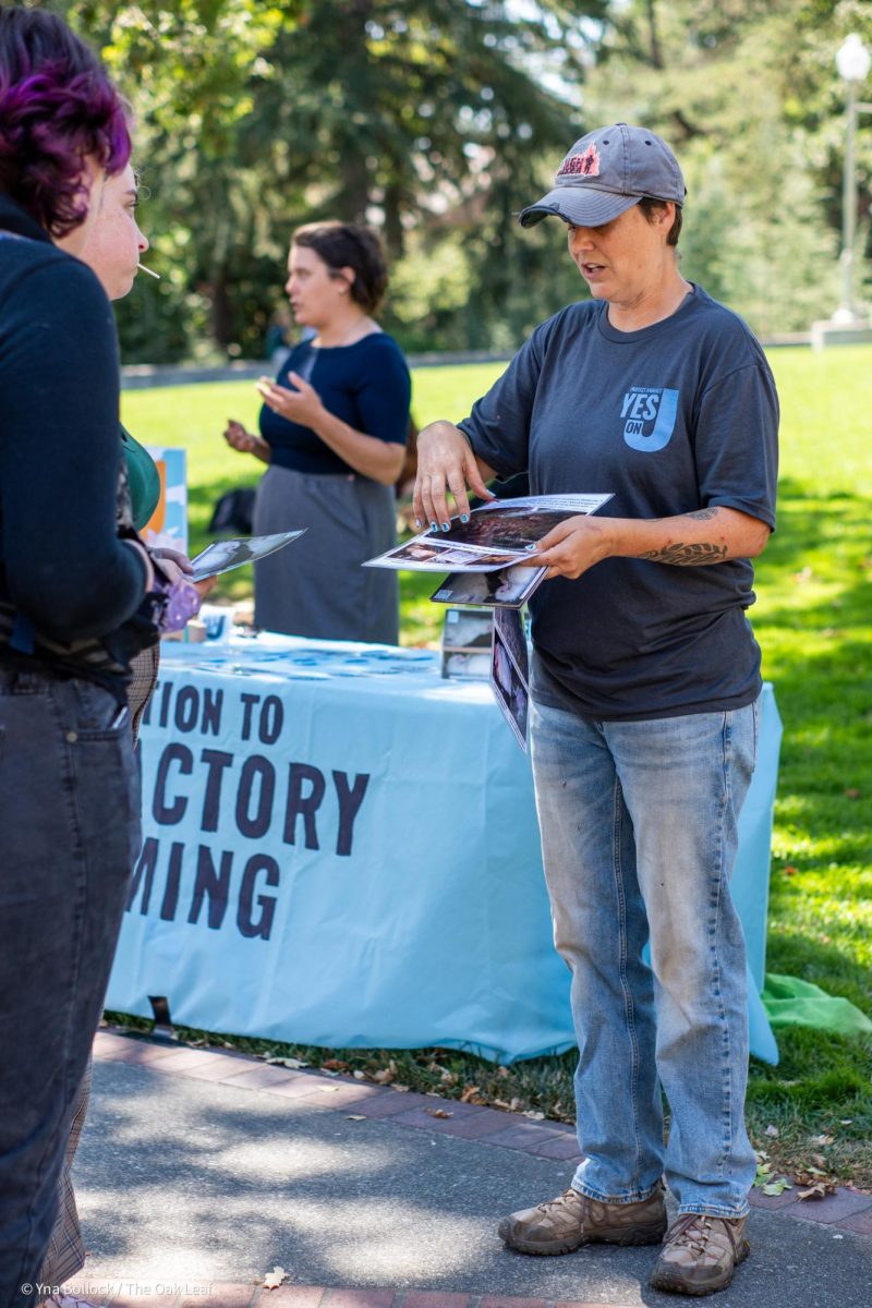 Organizer Carla Cabral present their case for "Yes on J" to SRJC students in the quad on Thursday, August 22, 2024 in Santa Rosa.