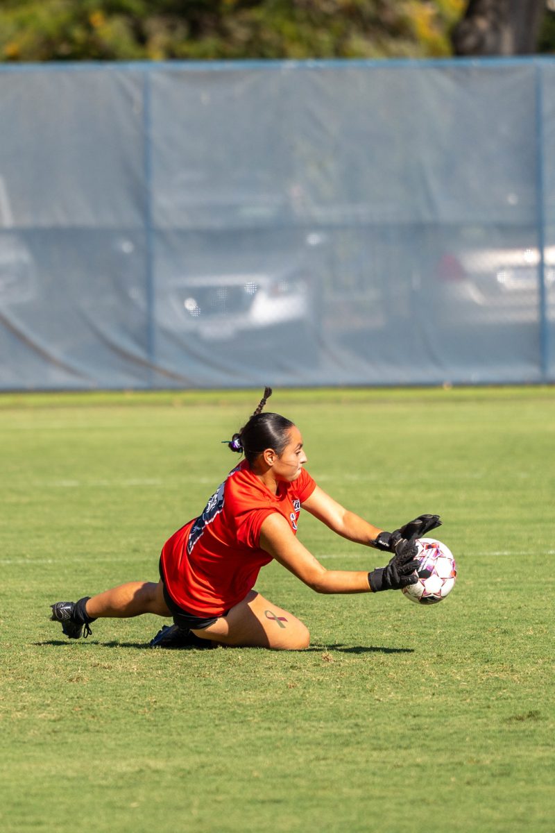 Santa Rosa’s goalkeeper Brooklyn Martens makes a smart save during warmups before the upcoming game against Hartnell on Sept. 24, 2024