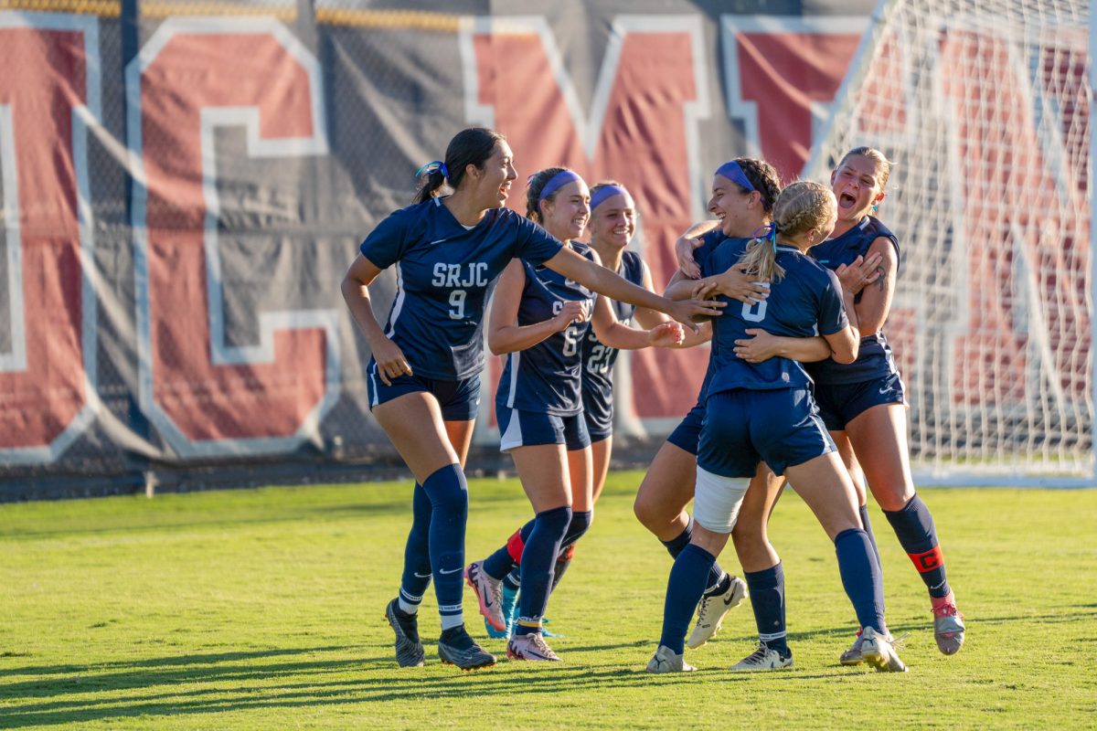 Santa Rosa’s forward Taylor Gandy embracing her teammates after netting the equalizer against Hartnell on Sept. 24, 2024 