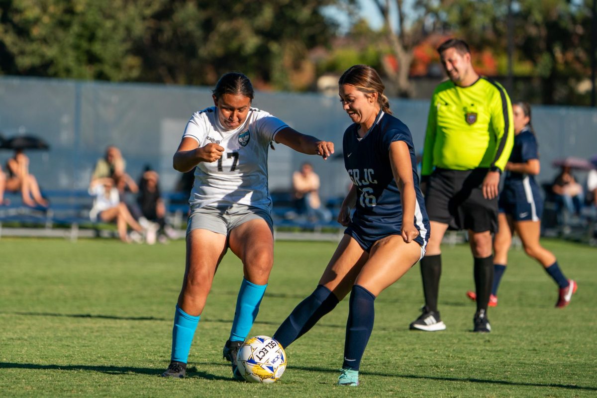 SRJC Midfield/Forward Haley Carranza juggles the ball away from Clovis' Izamar Ramirez at home against Clovis Community College on Thursday, September 6, 2024.