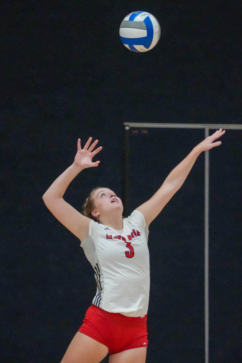 Santa Rosa’s setter Sierra Yates-Bruch serves the ball back into action against Folsom Lake on Friday, September 27, 2024. 