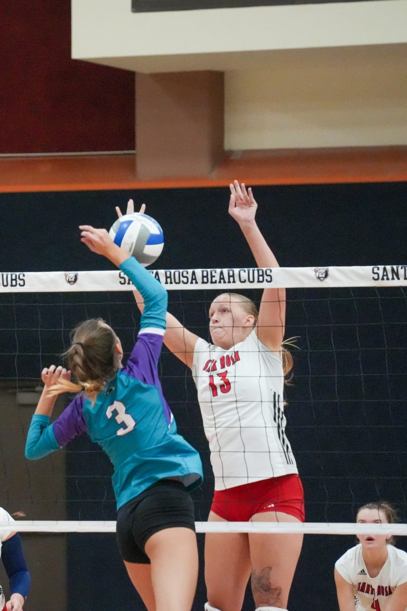 Bear Cubs middle blocker Sarah Thornton goes up for a block to deny the Folsom Lake Hawks on Friday, September 27, 2024.