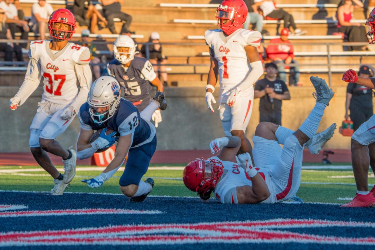 Wide receiver Ian Hocheder ties the game 21-21 in the third quarter with a 30 yard touchdown pass from Chase Vehmeyer at Santa Rosa's Bailey Field on Saturday, September 7, 2024.