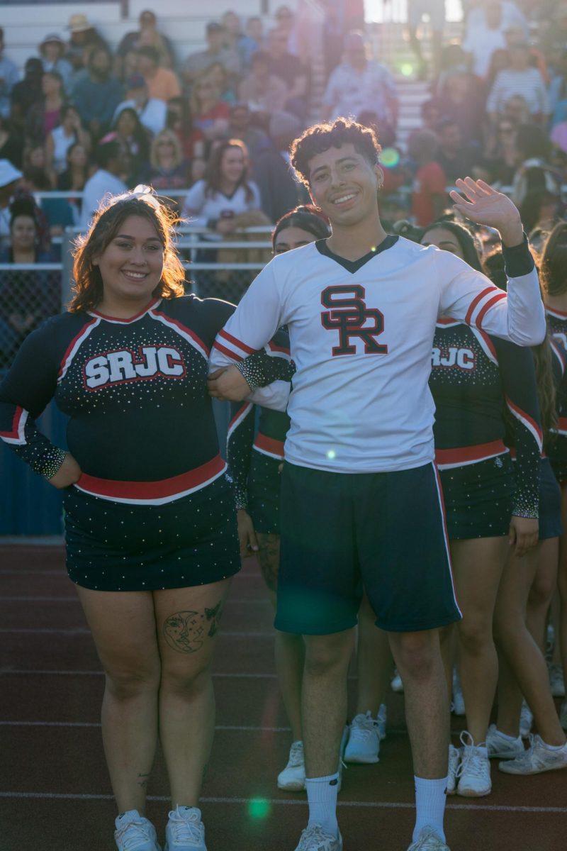 SRJC Cheer co-captains (from left to right) Thalia and Matthew get ready for the half time show at Santa Rosa's Bailey Field on Saturday, September 7, 2024.