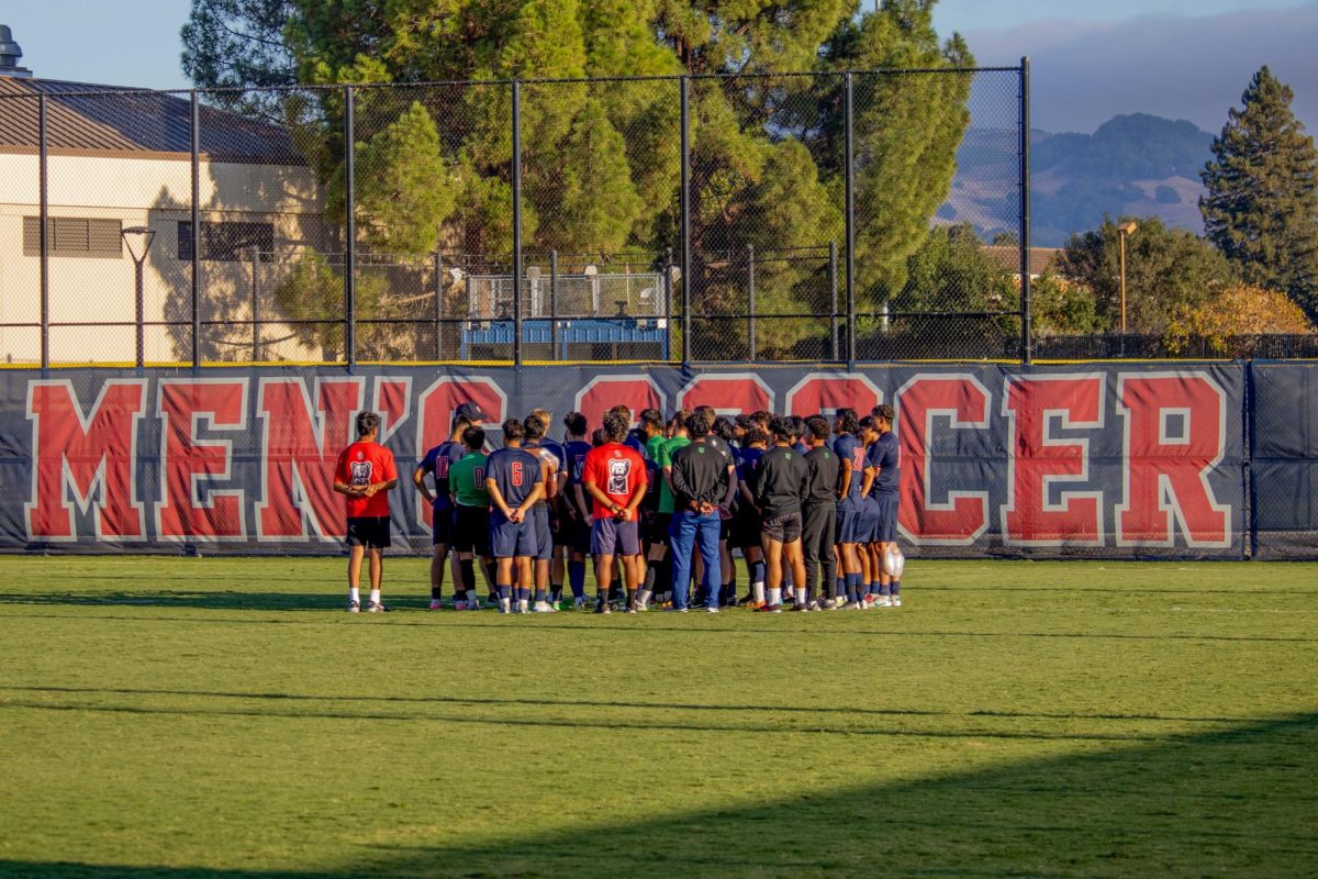 Head coach Marty Kinahan speaks to his players after a frustrating draw against Cañada at home on Tuesday, September 10, 2024.
