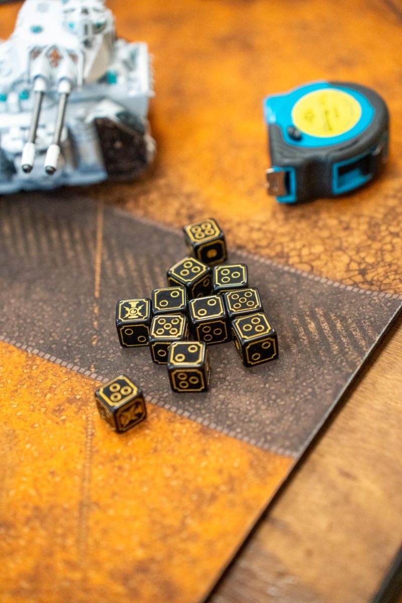 Dice and a measuring tape are among the supplies necessary to play "Warhammer 40k" at Sonoma Con in Santa Rosa on Saturday, August 31, 2024.