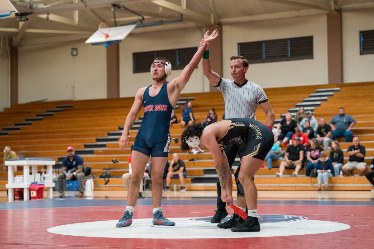 Zackary Morgan wins his first match of the day against Delta College in Haehl Pavilion on September 14, 2024.