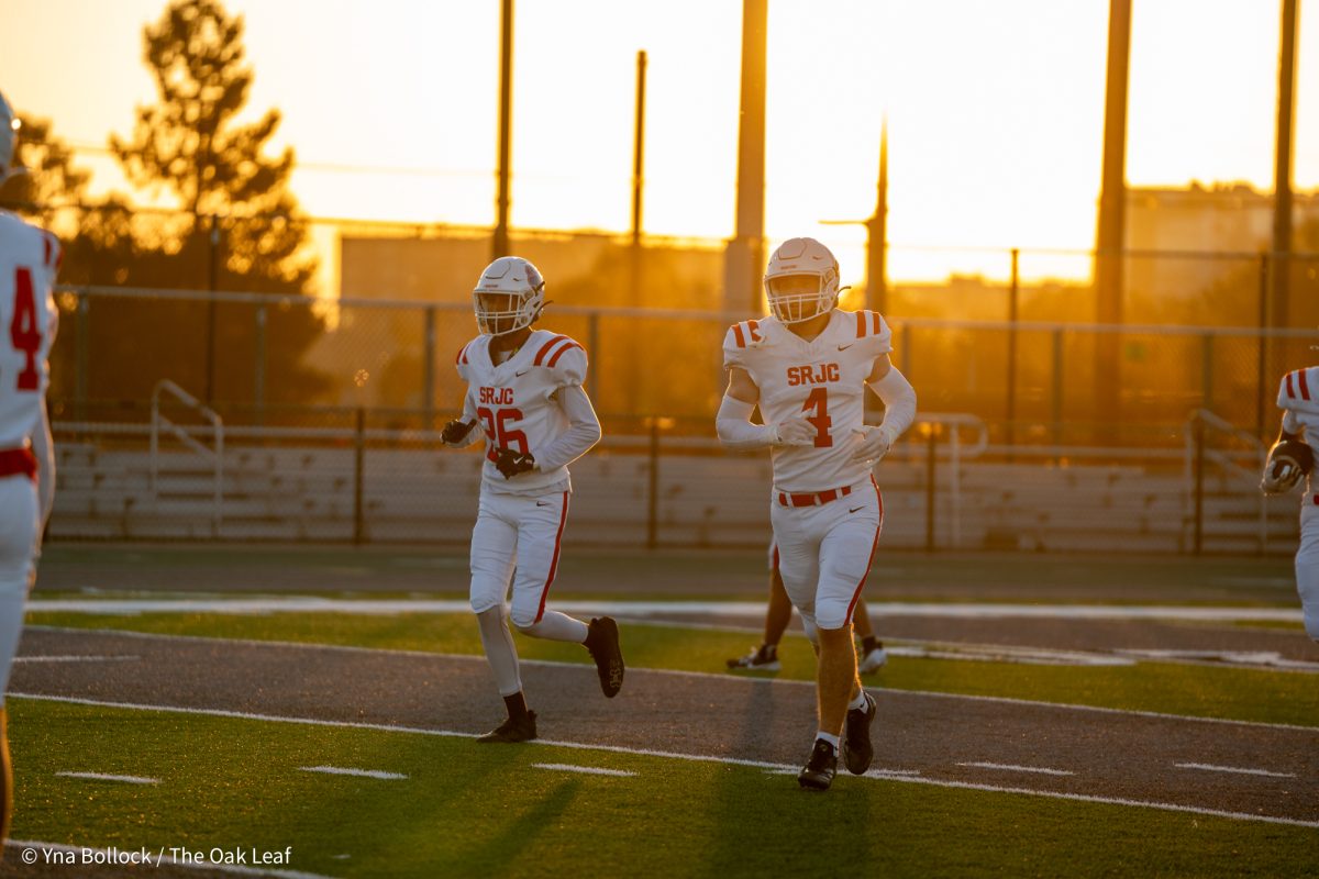 Silas Pologeorgis (right) and Diego Ruvalcaba (left) jog back to the line ahead of the game against Laney College on Friday, Oct. 4, 2024.
