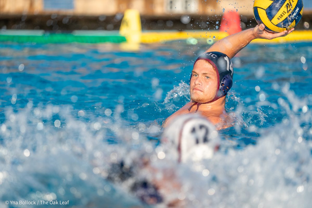 SRJC's Sebastian King Gile winds back to throw the ball to his teammate and away from American River on Oct. 9, 2024.