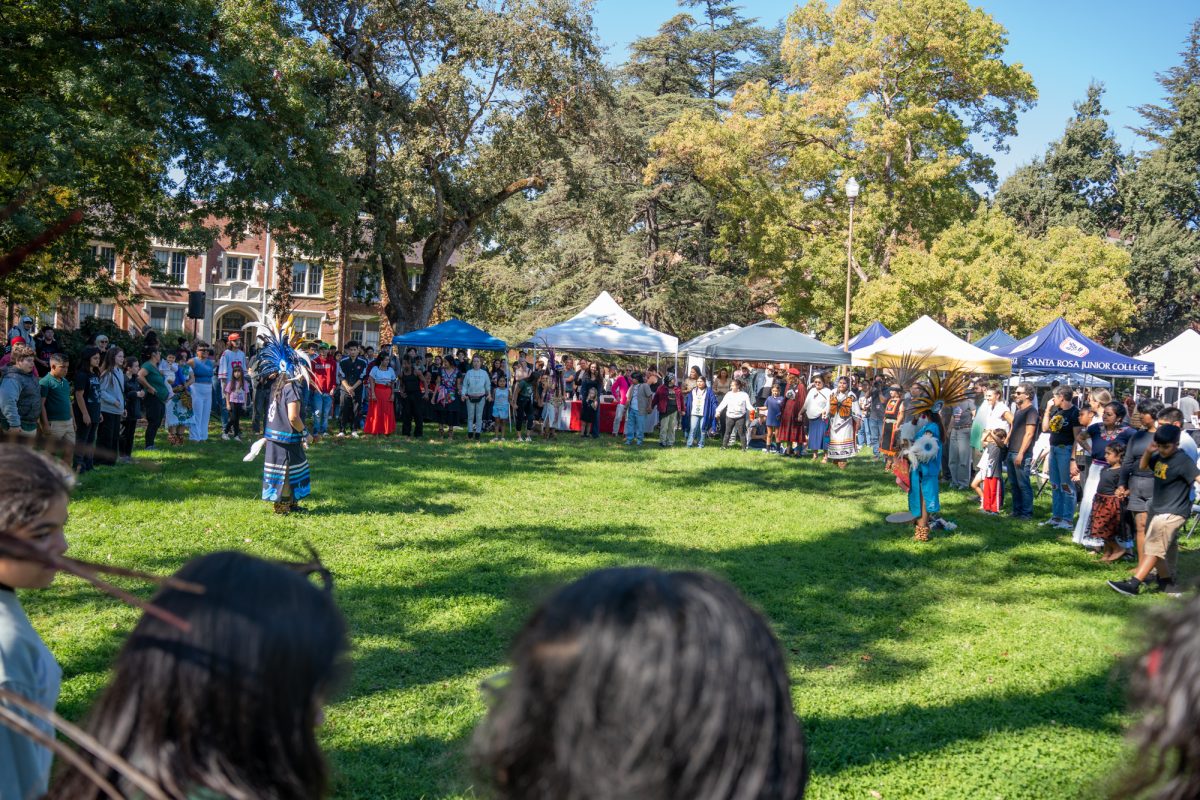 Danza Azteca Grupo Xantotl invites attendees for a friendship dance during the Indigenous Peoples' Celebration on the Santa Rosa campus on Monday, Oct. 14, 2024.