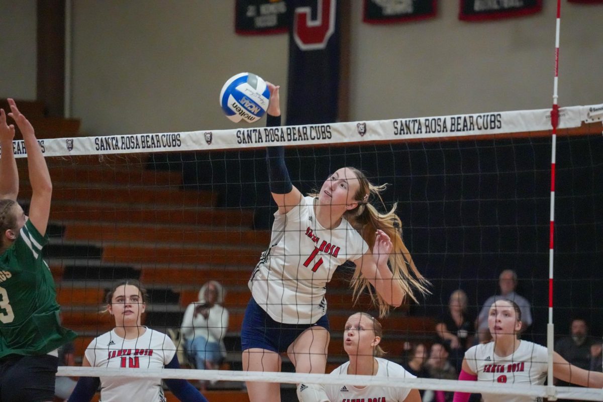 Bear Cubs middle/opposite Kiana Walker spikes the ball against Diablo Valley College at Haehl Pavilion on Oct. 9, 2024. 