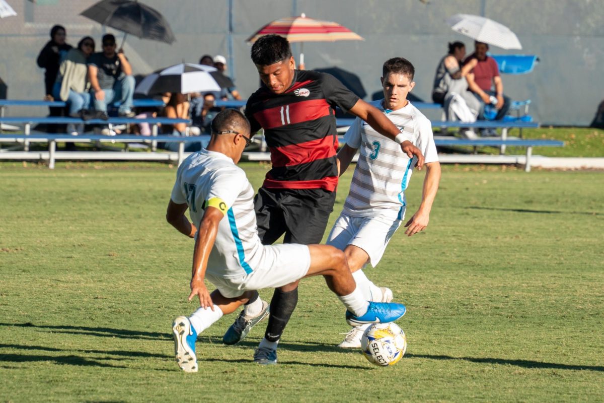 Santa Rosa’s midfielder Kleber Maldonado tries to make space for himself in search of the opening goal against Folsom Lake on Friday, Oct. 18, 2024.