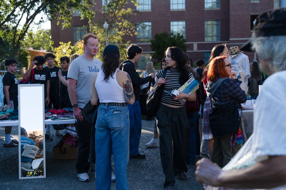 A crowd forms at the Green Living Fair in the Bertolini Quad on the Santa Rosa campus on Thursday, Oct. 10, 2024.