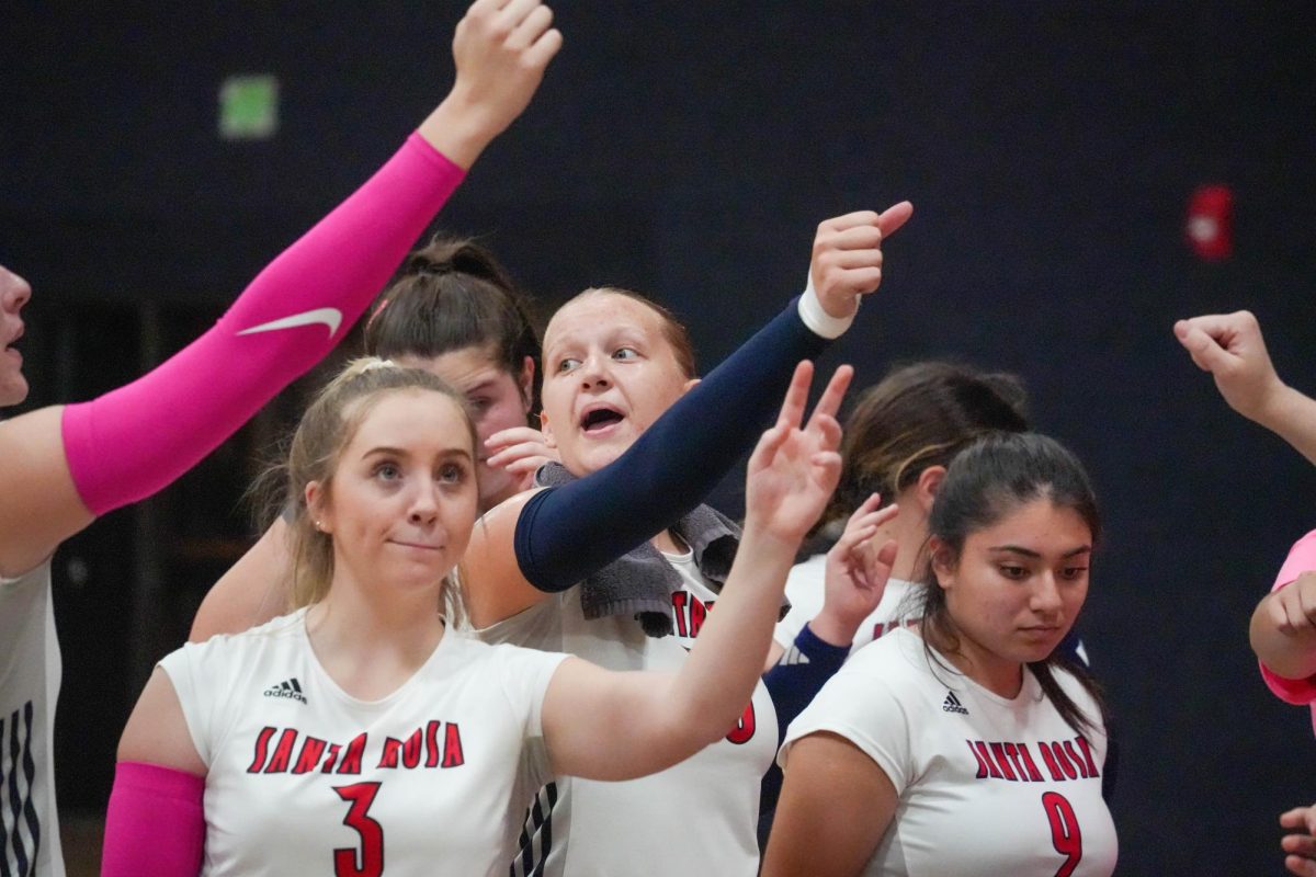 Santa Rosa’s middle blocker Sarah Thornton rallies the team during a timeout against Diablo Valley College at Haehl Pavilion on Oct. 9, 2024. 