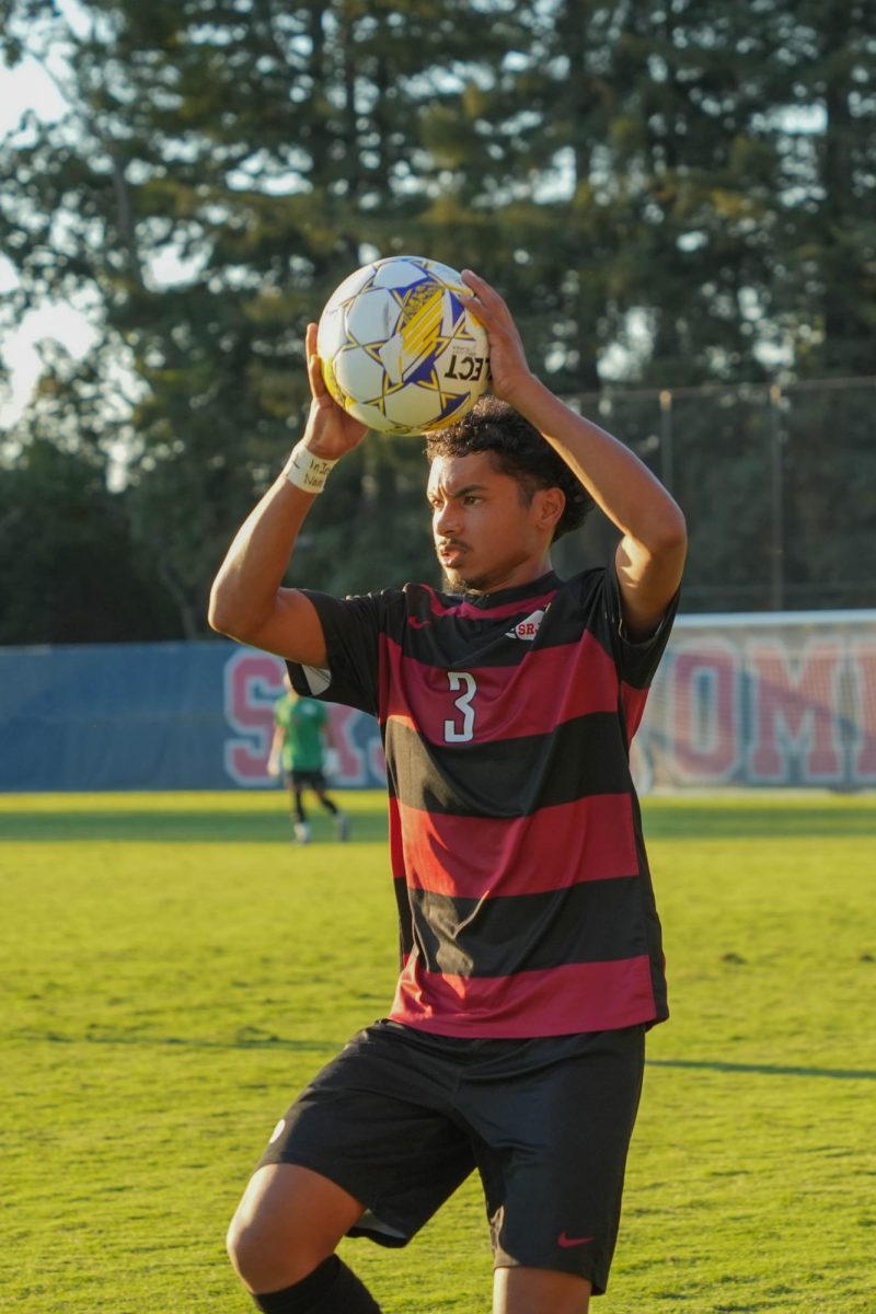  Bear Cubs defender Raffino Landford takes a throw-in against American River on Tuesday, Oct. 1, 2024
