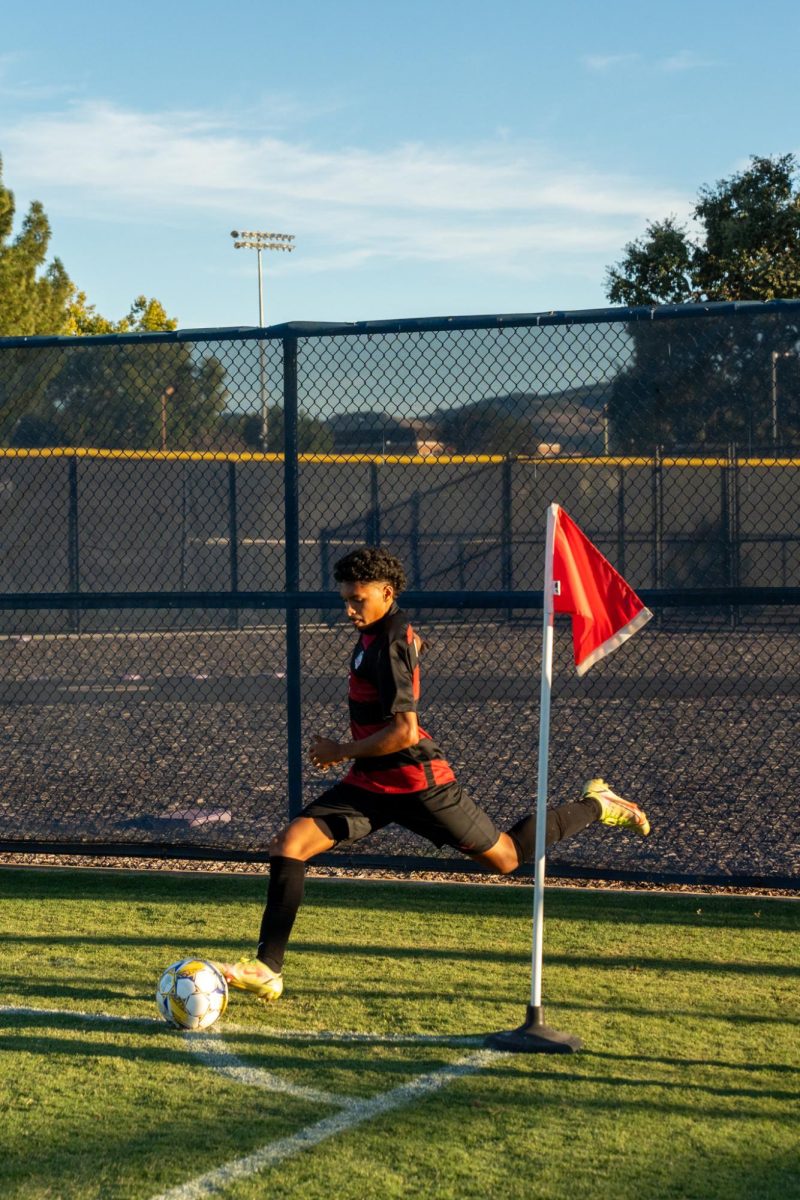 Bear Cubs defender Raffino Landford swings in a corner against Folsom Lake Friday, Oct. 18, 2024.
