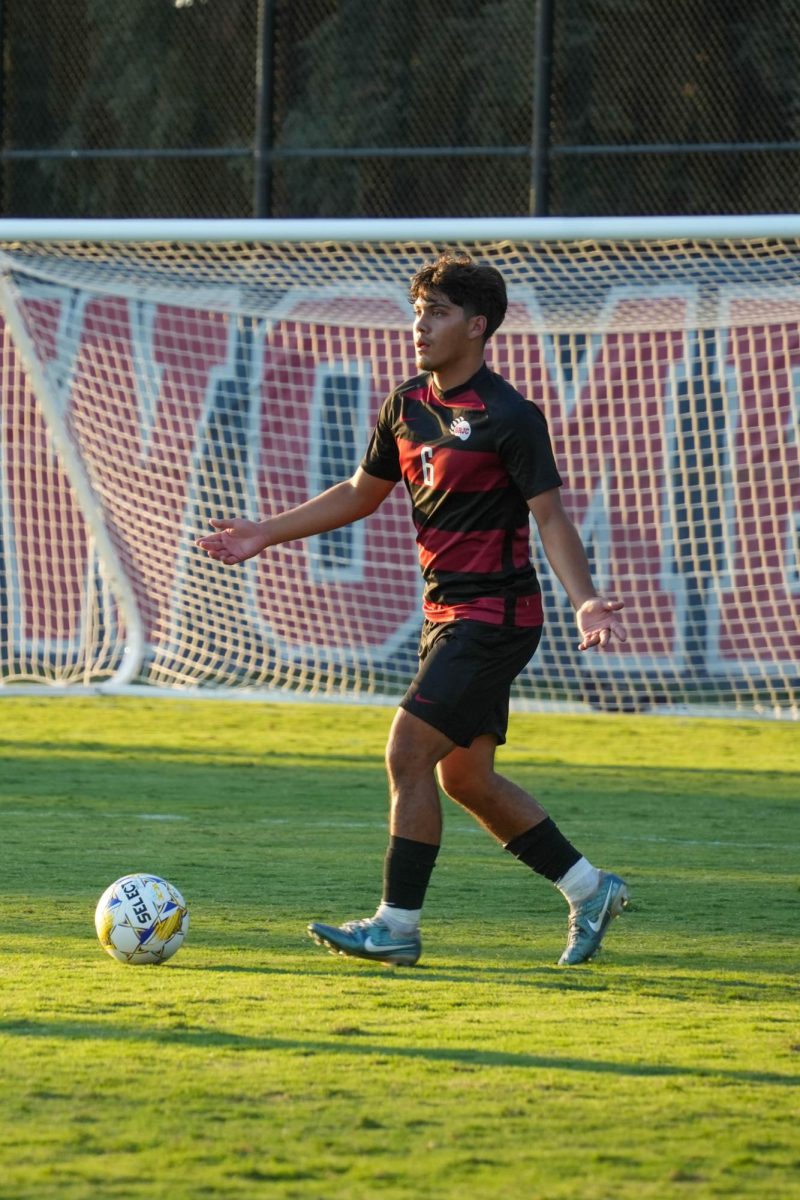 Santa Rosa’s midfielder Dominic Sanchez assesses his options against American River on Tuesday Oct. 1, 2024