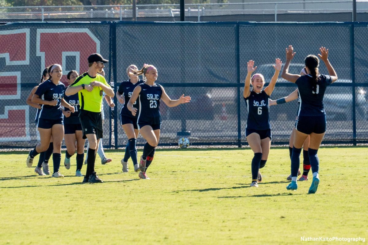 Santa Rosa’s midfielder/forward Olivia Hohnstein celebrates with defender Jocelyn Rojas-Garfias for delivering the assist for Dougherty’s second goal, and the team’s third on Tuesday, Oct. 22, 2024. 