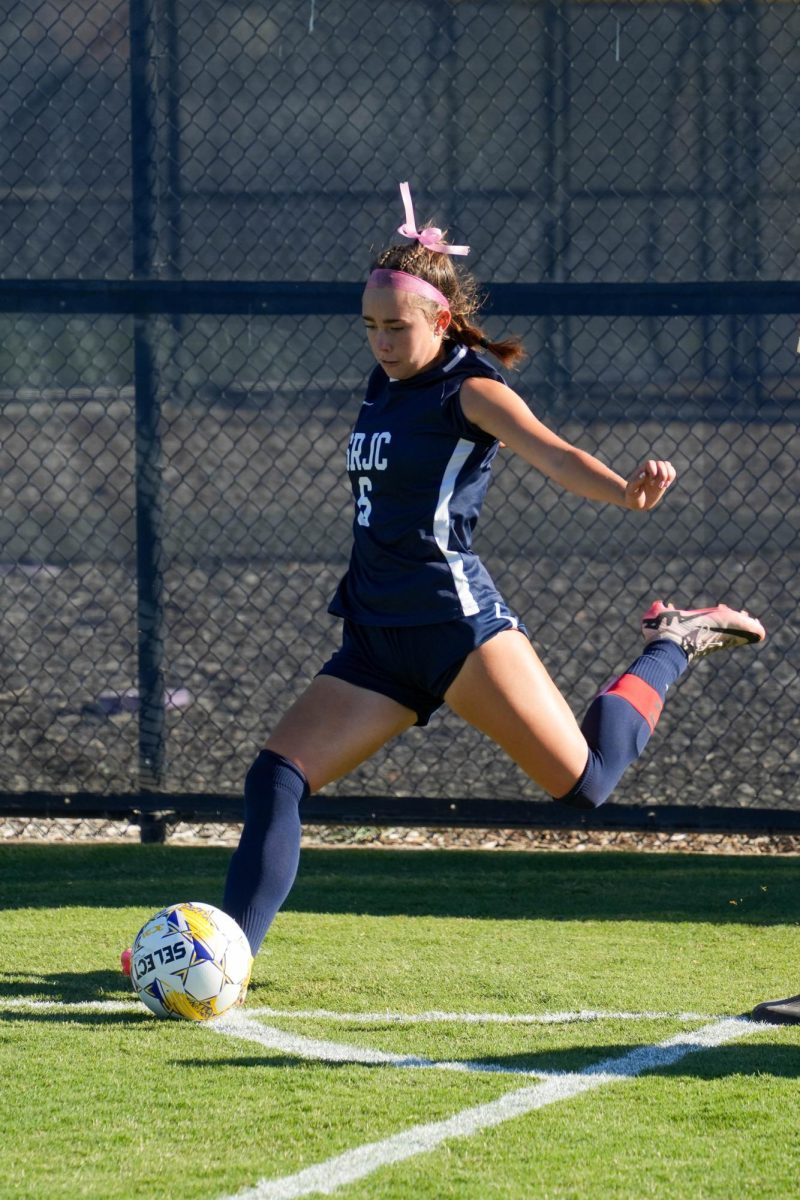 Bear Cubs midfielder/forward Olivia Hohnstein sends in a corner against American River College on Tuesday, Oct. 15, 2024. 