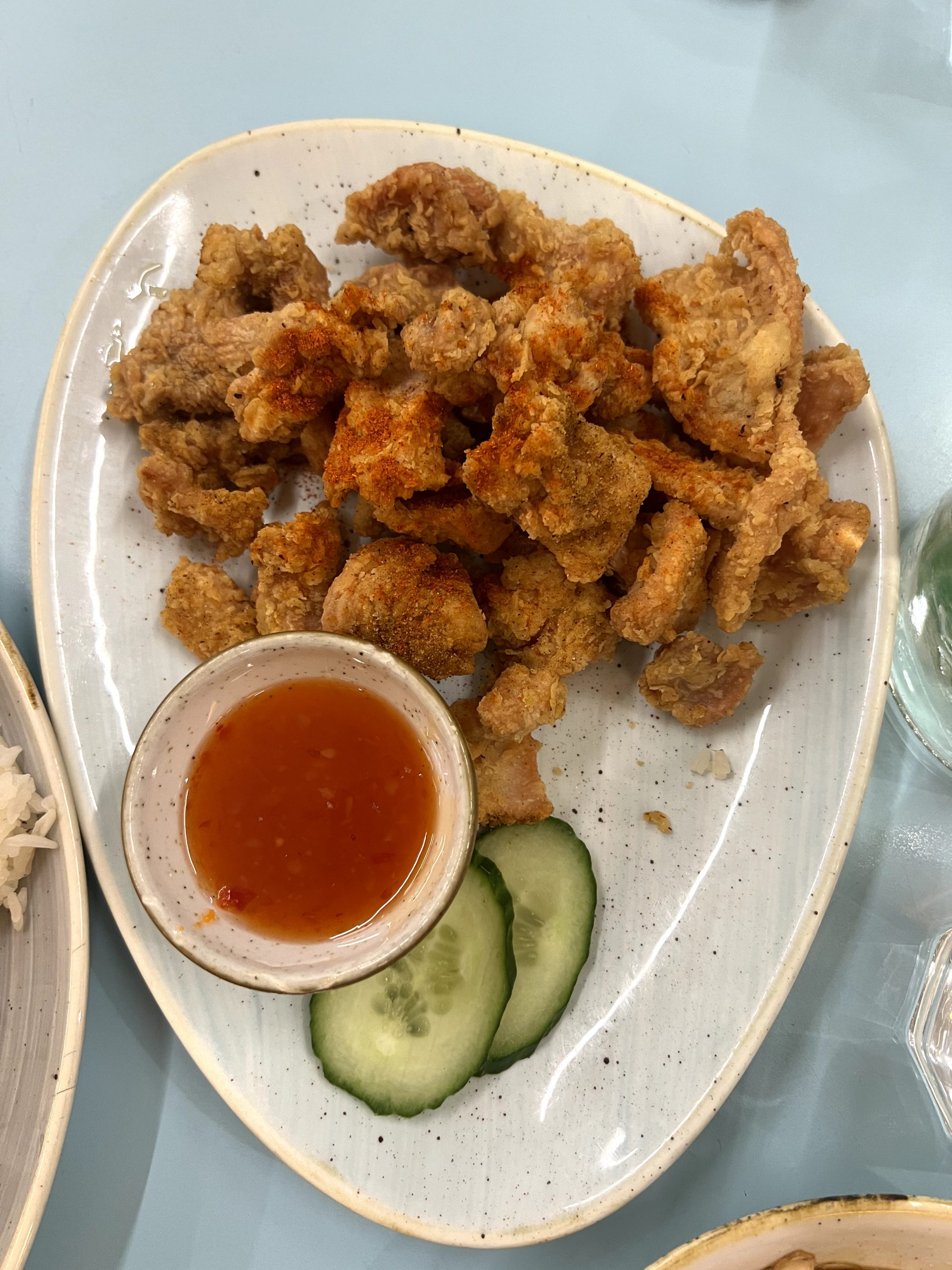 Firecracker popcorn chicken is topped with spices and accompanied by sweet and sour sauce from Rasa Sayang on Sept. 22, 2024.