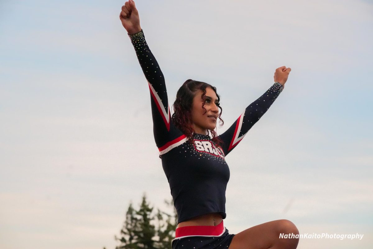 SRJC's Lilliana Alvarez finishes a stunt during a break the game against the College of the Sequoias at Bailey Field on Friday, Oct. 11, 2024.