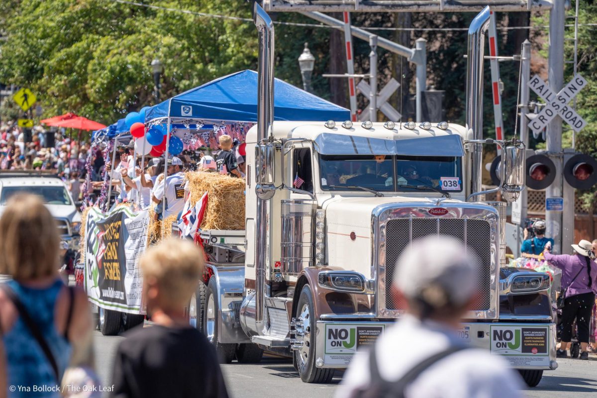 The No on J float drives down Main Street at the Penngrove Parade on July 7, 2024.