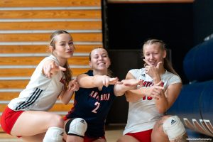 Santa Rosa’s Jasmine Forster, left, Jaiden Brooner, center, and Sarah Thornton, right, pose for a photo before their match against Sacramento City College at Haehl Pavilion on Friday, Nov. 1, 2024. 