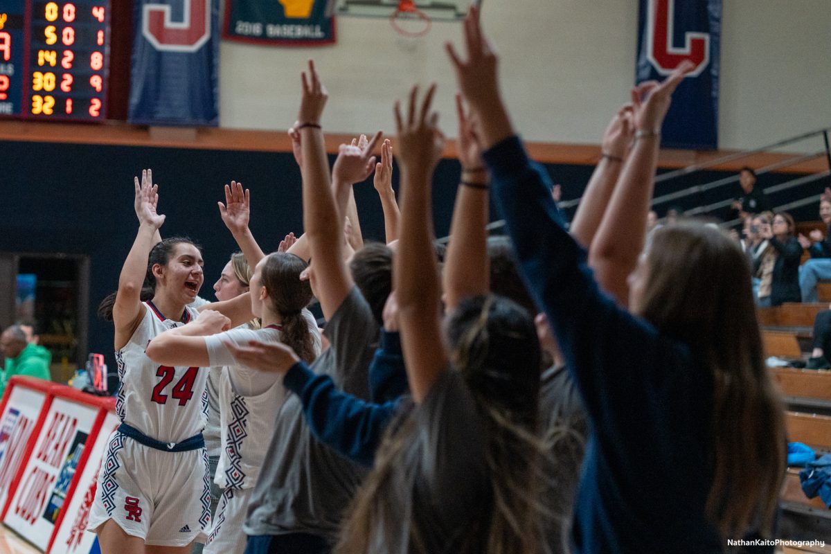 Bear Cubs’ forward Cece Solano celebrates a point with the bench and coaching staff against Laney at Haehl Pavilion on Friday, Nov. 22, 2024. 