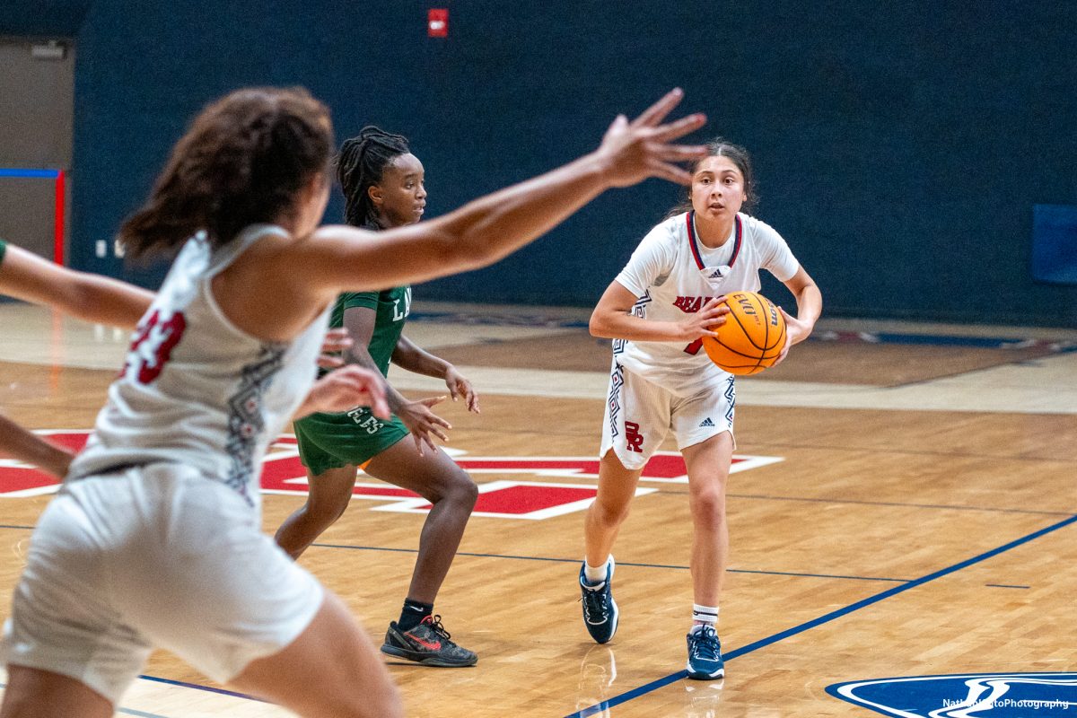 Santa Rosa’s guard Lindsey Arellano looks to pass the ball to guard/forward Ivy Gonzalez against Laney at Haehl Pavilion on Friday, Nov. 22, 2024. 