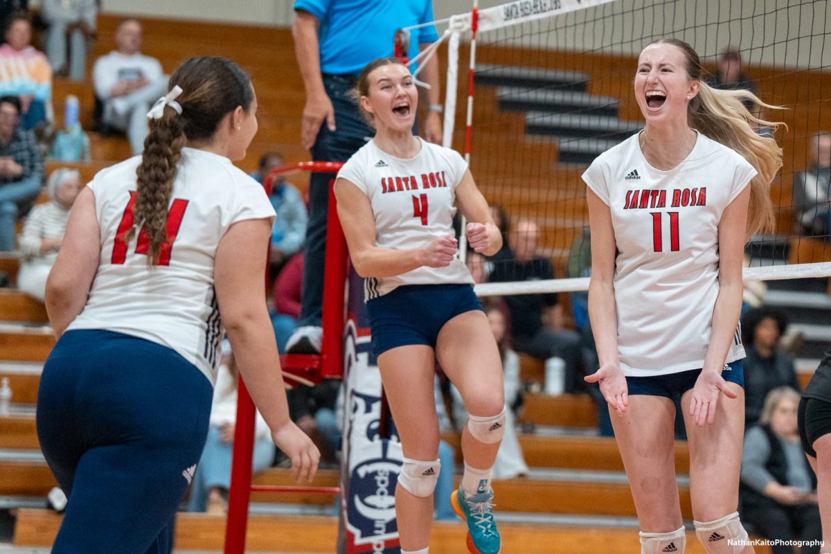 Bear Cubs’ left, Natalie Walsh, center, Madison Shaw, and left, Kiana Walker celebrates a point enthusiastically against San Joaquin Delta at Haehl Pavilion on Friday, Nov. 15, 2024.