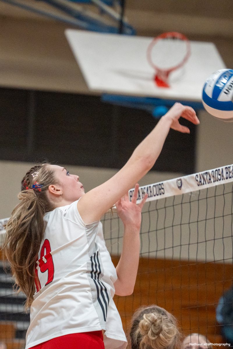 Bear Cubs’ middle blocker Eve Mendoza surges up for a spike against the College of the Sequoias at Haehl Pavilion on Nov. 23rd, 2024. 