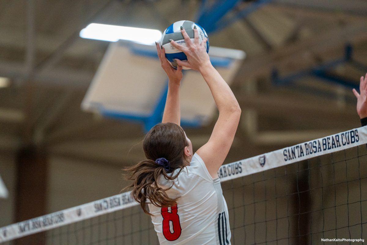 Santa Rosa’s outside hitter Katie Brenninger sets up a play against San Joaquin Delta at Haehl Pavilion on Friday, Nov. 15, 2024.