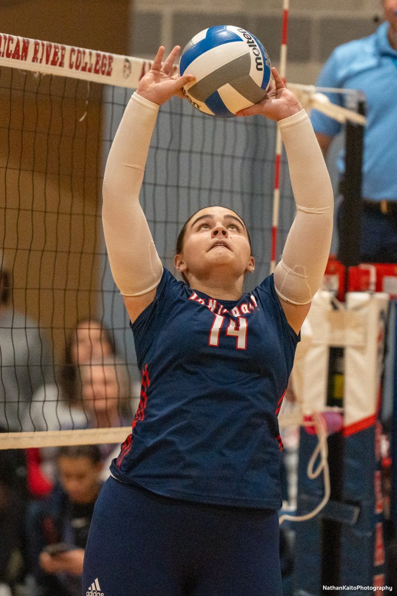 Bear Cubs’ setter Natalie Walsh cushions the ball for a kill against American River at the American River gym on Tuesday, Nov. 26. 