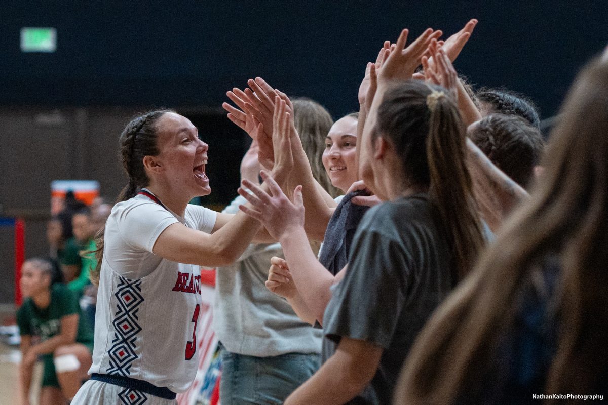 Santa Rosa’s guard Abigail Tacla celebrates ecstatically after guard/forward Ivy Gonzalez sinks a basket against Laney at Haehl Pavilion on Friday, Nov. 22, 2024. 